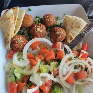 Doesn't look so bad in the photo, but the lettuce was gross.  Almost like it was frozen and thawed out.   Falafel was only decent at best.