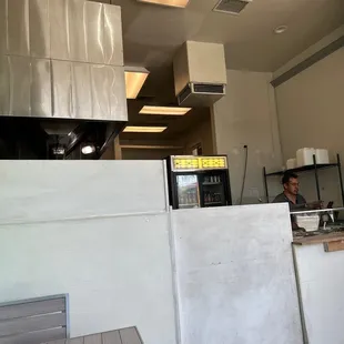 a man sitting at a counter