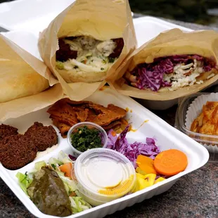 Falafel Pita Wrap ($10.75). Lamb Gyro Pita Wrap ($14.25). The Hesitator Combo ($15.75). Baklava ($3).