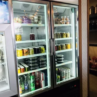 a refrigerator with food inside