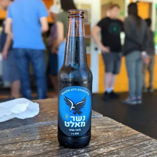 a bottle of beer on a table