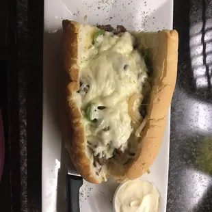 Tuesday special! Prime rib sub with fries. Topped with sautéed green peppers, onions and mushrooms.