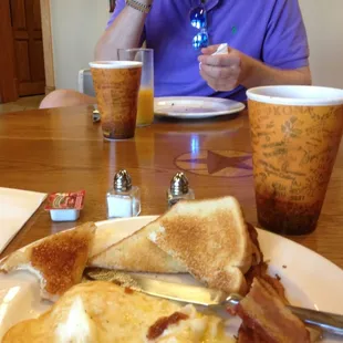 Breakfast made to order: bacon eggs toast. I needed a nap after