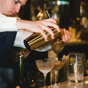 Bartending at Falcon's Lair.  Photos by ShootAnyAngle Photography.