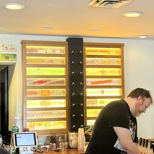 a bartender pouring a drink