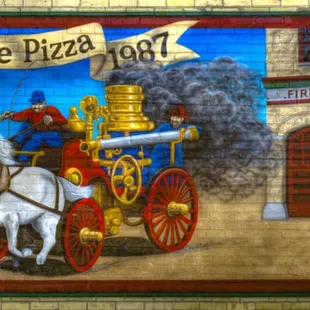 When in Sheboygan Falls, WI, stop here first.  Great thin crust pizza and old Sheboygan Falls ambiance.  Muriel is on west exterior wall!