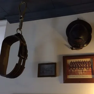 a fireman's hat hanging from the ceiling