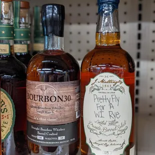 a variety of liquor bottles on a shelf