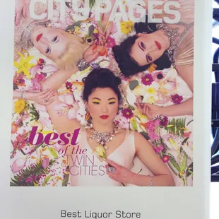 a picture of two women laying on a bed of flowers