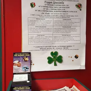 a table with books and a poster