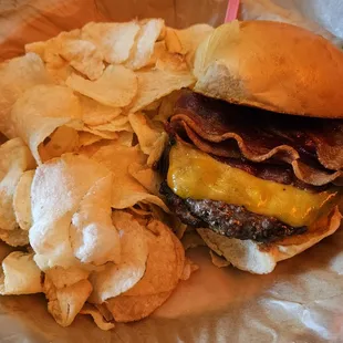Barrel Burger topped with cheddar cheese, caramelized onions and bacon.