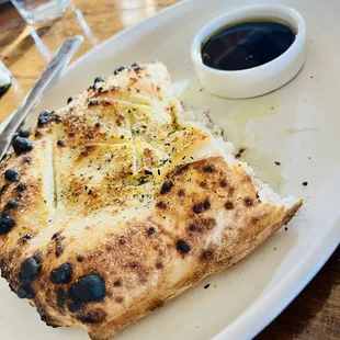 Delicious breadsticks and oil/balsamic with seasoning