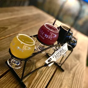 Our flight, front two are Cara Bear &amp; Papa Smurf sours.