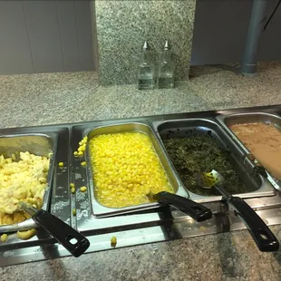 Macaroni and cheese, corn, greens and brown beans