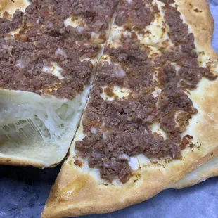 a half eaten pizza on a table