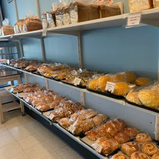 a variety of baked goods on shelves