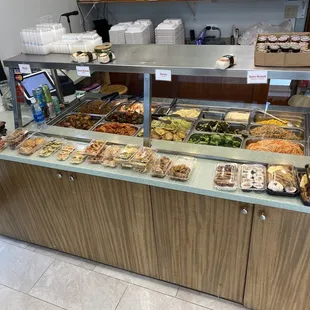 Grab and go bentos and spam musubi. Lots of sides for the plate lunches.