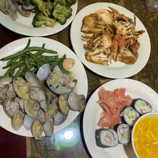 three plates of food on a table