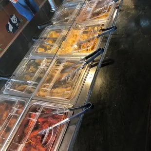 a variety of food in plastic containers