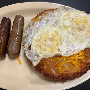 Loaded hash browns with eggs and sausage added -Pedro's Stuffed Hash Browns