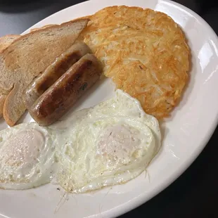 The Cleveland. Two eggs, choice of meat, toast and hashbrowns.