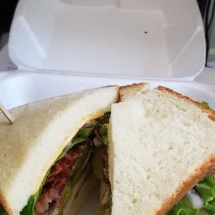 Turkey, bacon with American cheese. Simple, fresh, bread is made there...