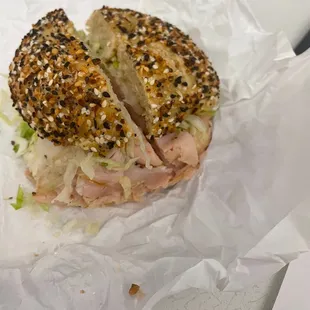 a close up of a bagel sandwich