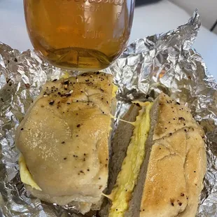 Egg, turkey sausage, and yellow American cheese on a plain bagel