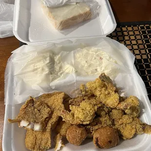 #1 Combo - Fish, Shrimp, Oyster, Hushpuppies with double potato salad and bread