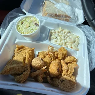 Cat fish, shrimp, hush puppies, cole slaw and macaroni salad