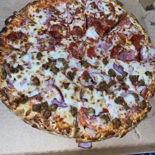 Half sausage and onion and half pepperoni and ham large pizza
