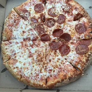 Half cheese half pepperoni pizza $6.55