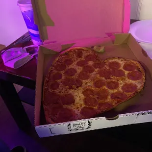 Valentine&apos;s Day pizza served!