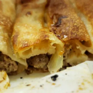 Inside the stacked meat Burke, very good with moist  meat and onions rolled inside, that's fuc#ing delicious, see the onions.