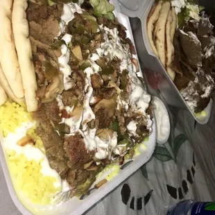 two trays of food on a table