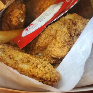 Chicken wings in take-out bag