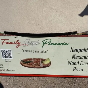 a sign for a pizza