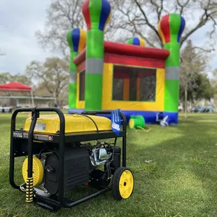 Balloon Deluxe Bounce House with small generator