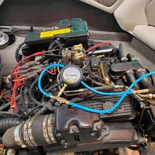 Pressure check on fuel injected motor.