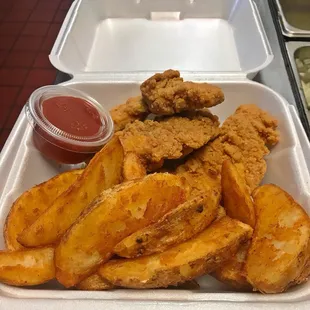 Chicken strips with potato wedges
