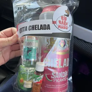 a person holding a bag of food