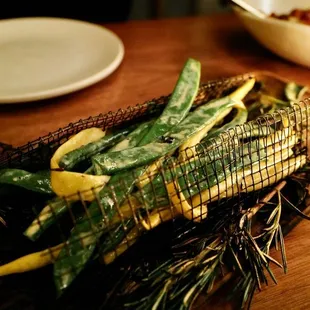 grilled fish on a wooden cutting board