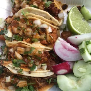 Tacos: too to bottom chorizo, chicken, pork (al pastor), asada.