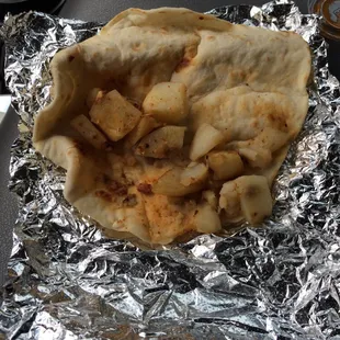 This is what they call "Papas con chorizo"!  Sad. There are literally two tiny pieces of chorizo thrown in with boiled potatoes.