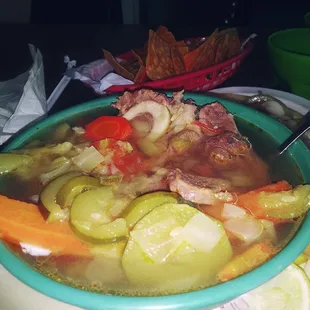 a bowl of soup with vegetables