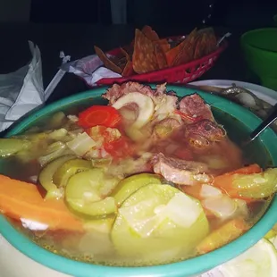 a bowl of soup on a table