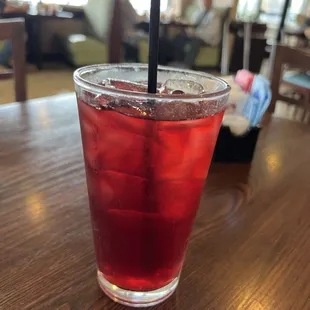 A refreshing glass of raspberry iced tea