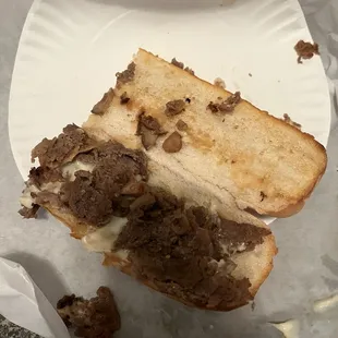 Large steak and Steak &amp; Mushrooms Grinder. Saddest looking sub ive ever seen.