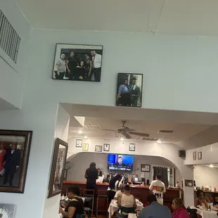Dining area with bar in the rear.