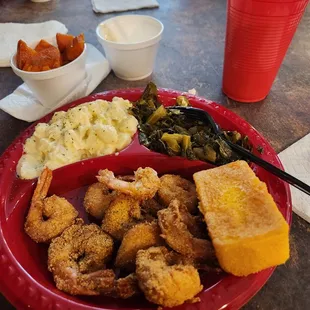 Fried shrimp potato salad collard greens sweet potatoes corn bread